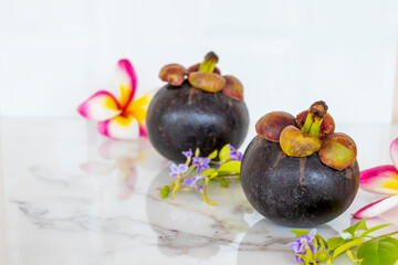 mangosteen super fruit local of asia with flowers frangipani arrangement flat lay style on background white