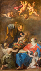 VIENNA, AUSTIRA - JULI 5, 2021: The painting of Holy Family in the church Jeusitenkirche by Andrea Pozzo from begin of 18. cent.