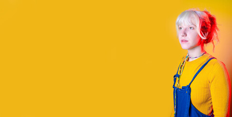 young caucasian woman isolated posing looking away pensive and dreaming on copyspace background banner