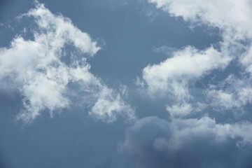 white clouds with bright sky