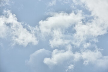 white clouds with bright sky