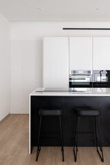 Modern luxury minimalist black and white kitchen