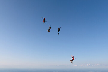 Freefly skydiving. Fun jump. Skydivers are flying in the sky.