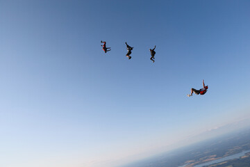 Freefly skydiving. Fun jump. Skydivers are flying in the sky.
