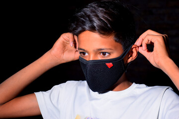 13 years old Asian cute boy wearing protective mask, prevention of Corona virus (Covid -19) and...