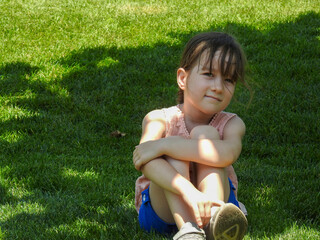 child playing on a grass