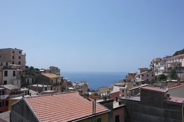 Fototapeta premium siesta warm cityscape view Riomaggiore in the picturesque regoin Cinque Terre Italy 