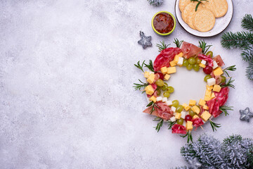 Fototapeta na wymiar Appetizers in shape of Christmas wreath