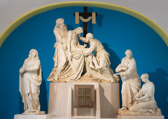 VIENNA, AUSTIRA - JULI 5, 2021: The the baroqwue craved sculptural group of Deposition of the Cross...