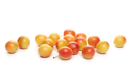 Wild yellow plums, prunes isolated on white background