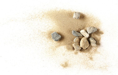 Beach sand pile with rocks isolated on white background and texture, top view