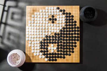 Desk for board game Go or Weiqi  and vector yin yang Tai Chi symbol of harmony and balance