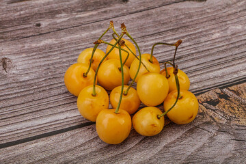 Sweet ripe yellow cherry heap