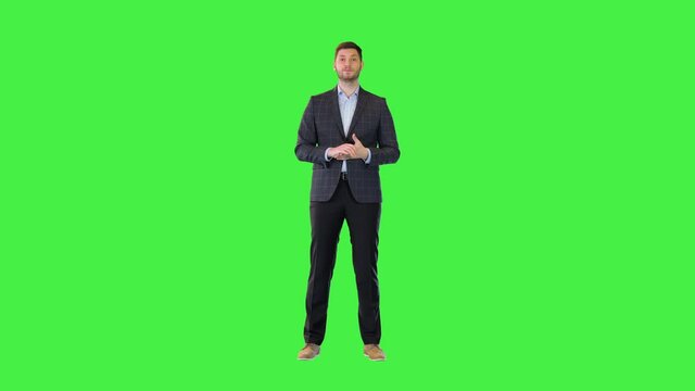 Businessman leader or manager speech on interview, conference Young politician present project plan on a Green Screen, Chroma Key.