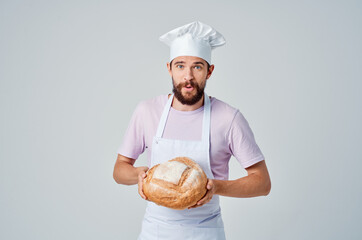 man in chef's uniform cooking food baking cooking