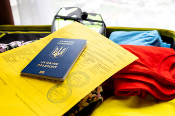 ukraine covid passport vaccination at bags with stuff