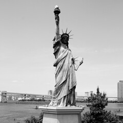Tokyo landmark - replica of Statue of Liberty. Black and white Japan.
