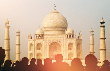 Fototapeta na wymiar View of Taj Mahal with tourist silhouettes