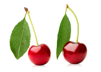 two cherries with leaves on white isolated background