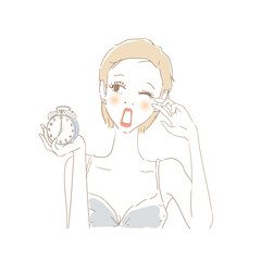 寝起きの女性　目覚まし時計