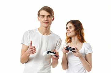 funny man and woman with joysticks in hands video games hobbies friendship