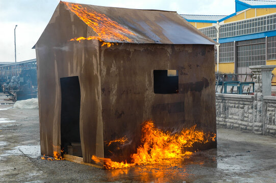 Burning Wooden House In Fire Drill