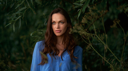 Summer portrait of a beautiful wonan in the nature