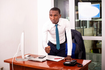 young serious businessman in an office.