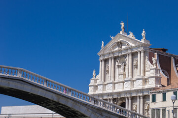 facades of the narrow streets of the old city of Venice