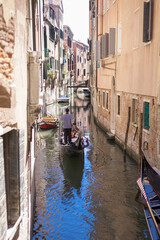 Obraz na płótnie Canvas romantic idyllic views of the narrow canal street and renaissance facades of the city of Venice