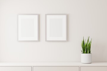 Blank two picture frame mock up on the white wall with little tree. 3d rendering.