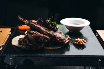 Organic Grilled Lamb Chops on stone board