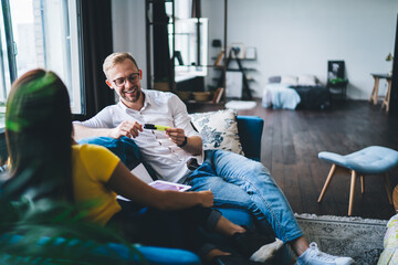 Happy colleagues discussing project together