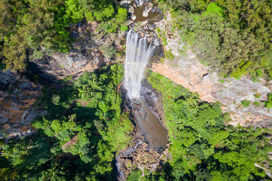 Purling Brook Falls in full flow drone aerial photo in Springbrook National Park, Gold Coast, Queensland, Australia