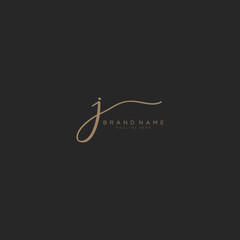 letter J gold handwritten logo vector design template. Black background.