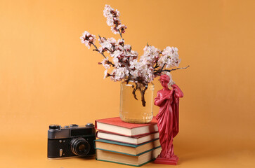 Spring retro still life on orange background