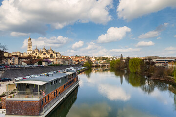 View of the Isle river and the Saint Front cathedral in Perigueux from the bridge Saint George, Dordogne Department, Nouvelle Aquitaine region. France.