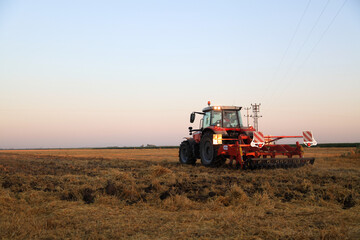 tractor in the hay field