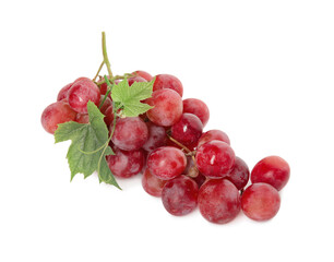 Cluster of ripe red grapes with green leaves on white background, top view