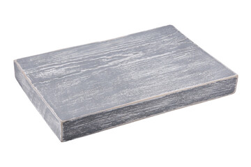 A small textured board, painted in a gray shade with a light pattern and frayed edges, lies in perspective, isolated on a white background.