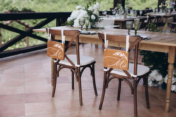 Boho wedding chair with eco decor for guests.