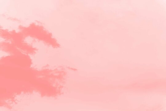Abstract coral soft color sky background with clouds, copy space