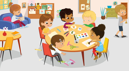 Cute little boys and girls spending time at international class room art handicraft lesson