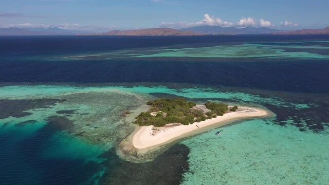 Aerial footage of the stunning sandbar and island taka makassar in Komodo area near Labuan Bajo in Flores, Indonesia. Shot with a rotation motion