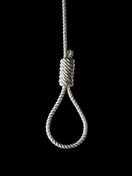 loop of white rope on a black background