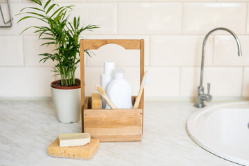 Fototapeta na wymiar Ecologic dish washing concept. Natural sponghes,wooden box,ecofriendly lifestyle