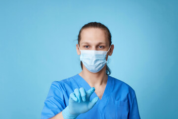 man doctor in uniform touching virtual screen