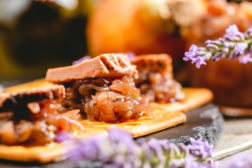 Onion jam with lavender flavor on crackers