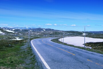 Hardangervidda road landscape in Norway. Retro filtered color style.
