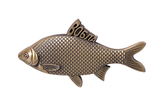 Metal golden  fish isolated on white background. Russian inscription means "Caspian roach".  Design element with clipping path